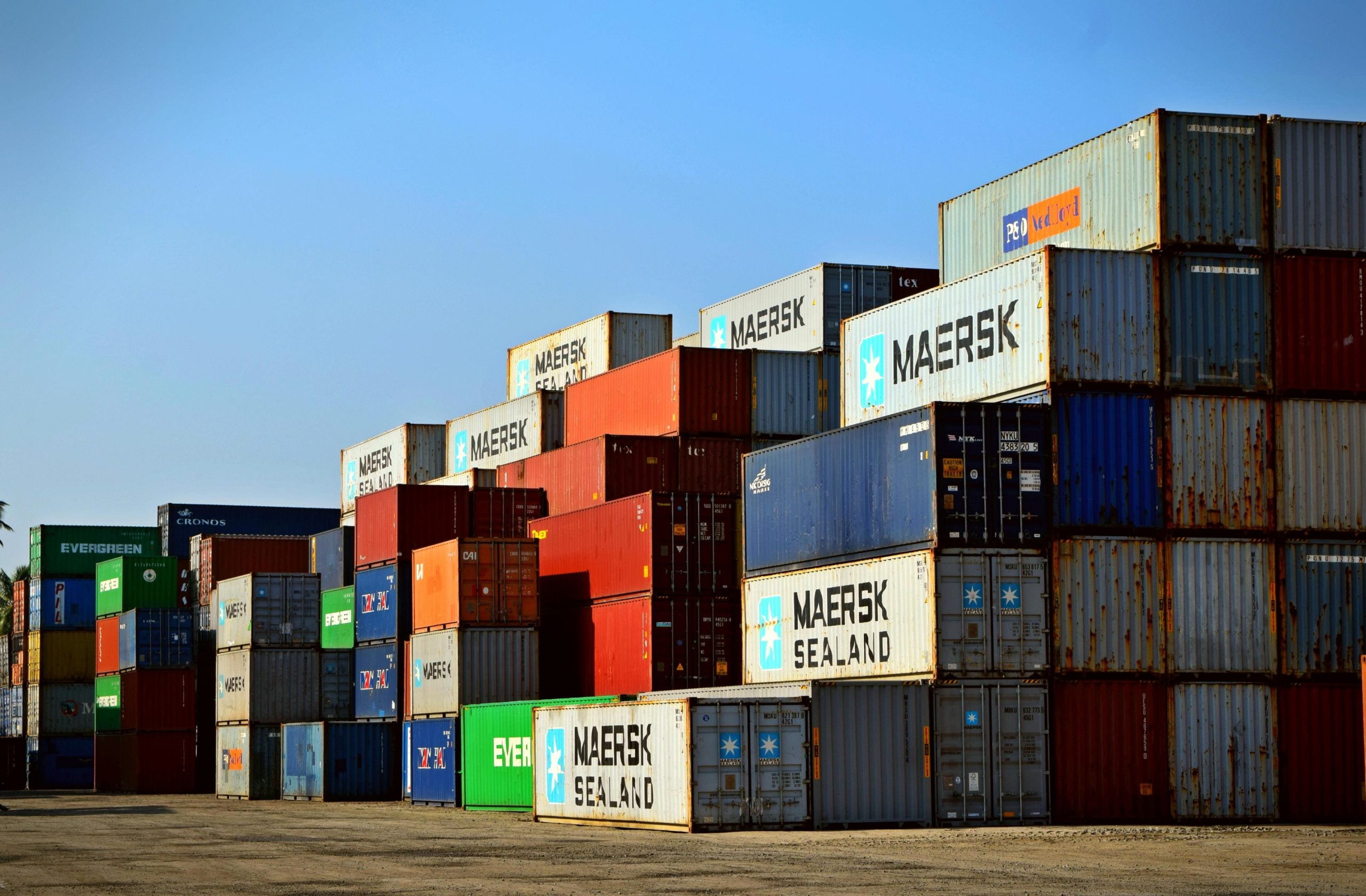 Busy cross-dock with multiple pallets and racking