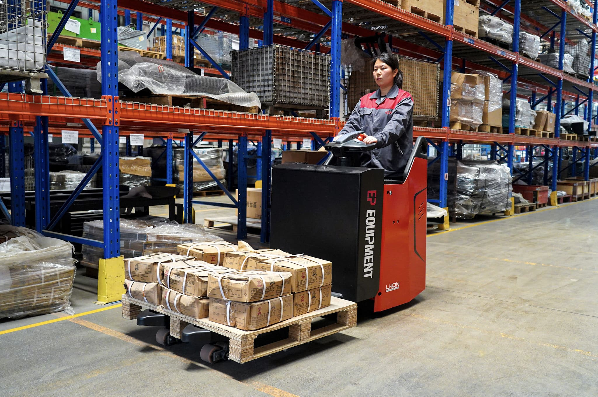 Order picker retrieving cases in warehouse