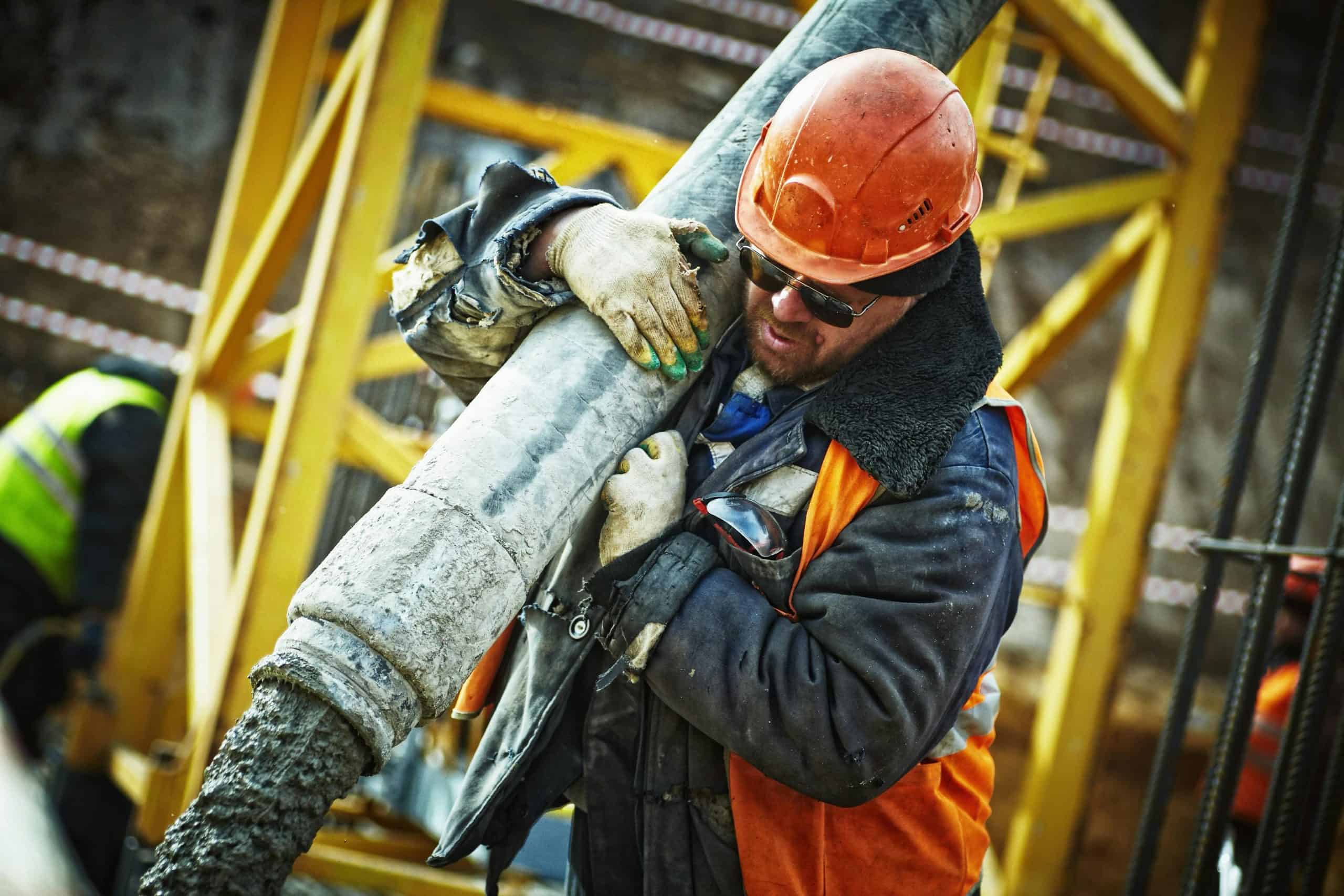 Electric forklift lifting materials on construction site