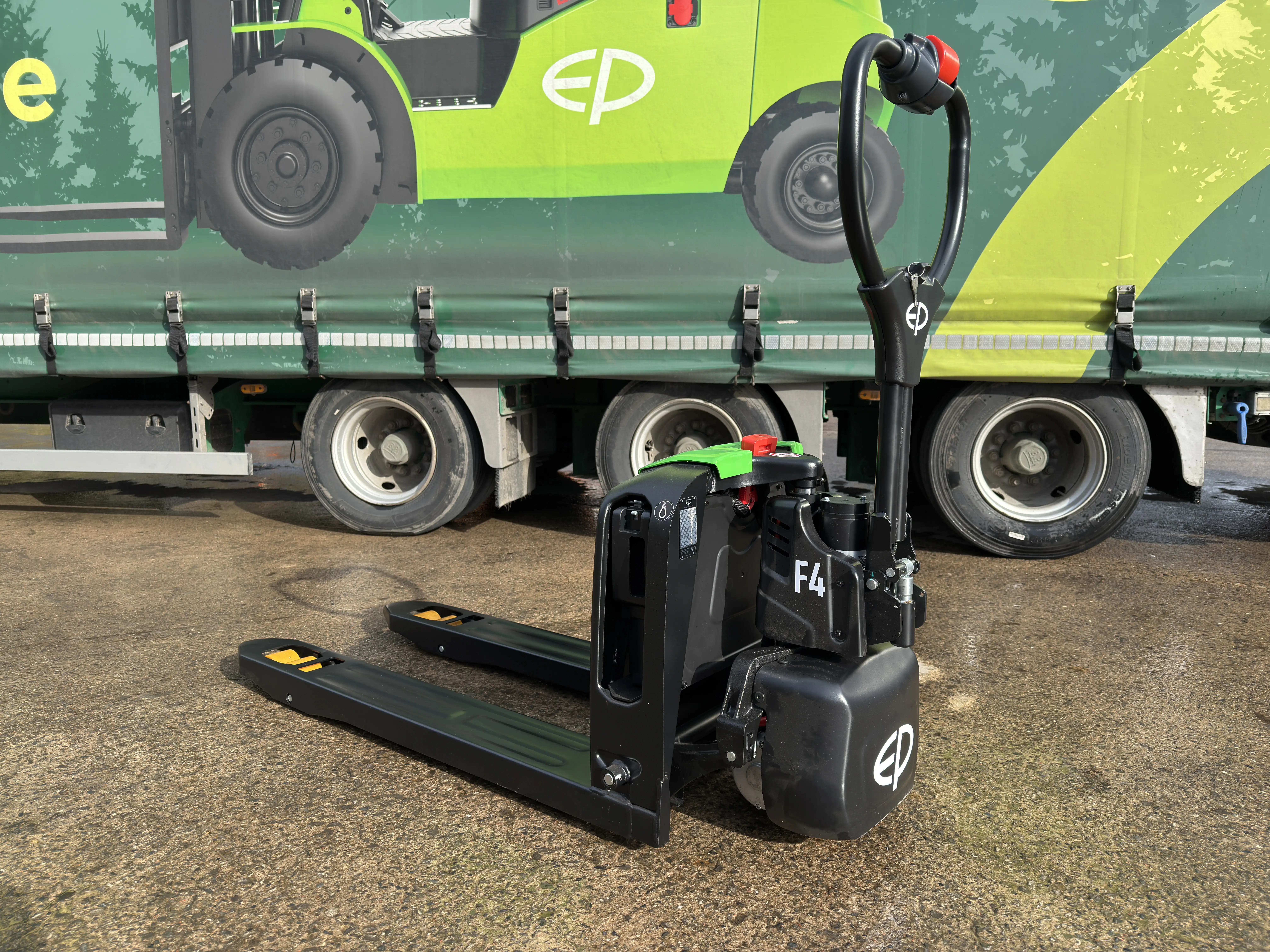 EP electric pallet trucks and stackers in a warehouse