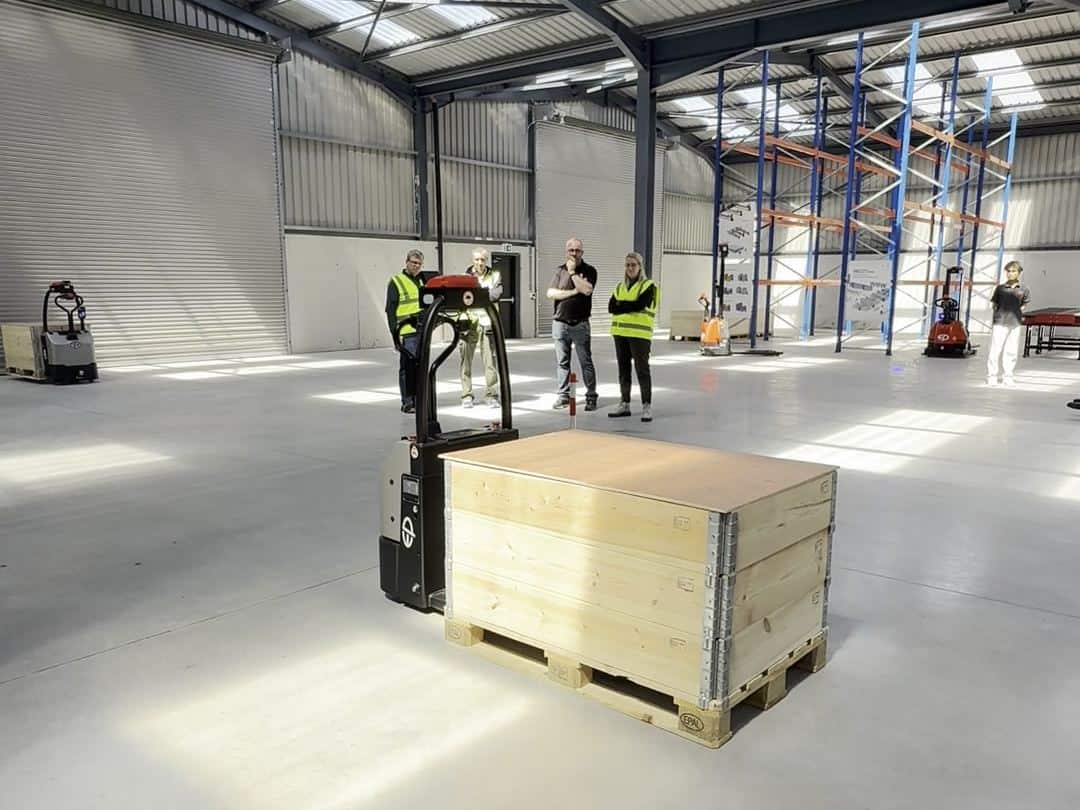 EP X-Mover automated pallet truck carrying a pallet in the Clearlift Navan demo warehouse