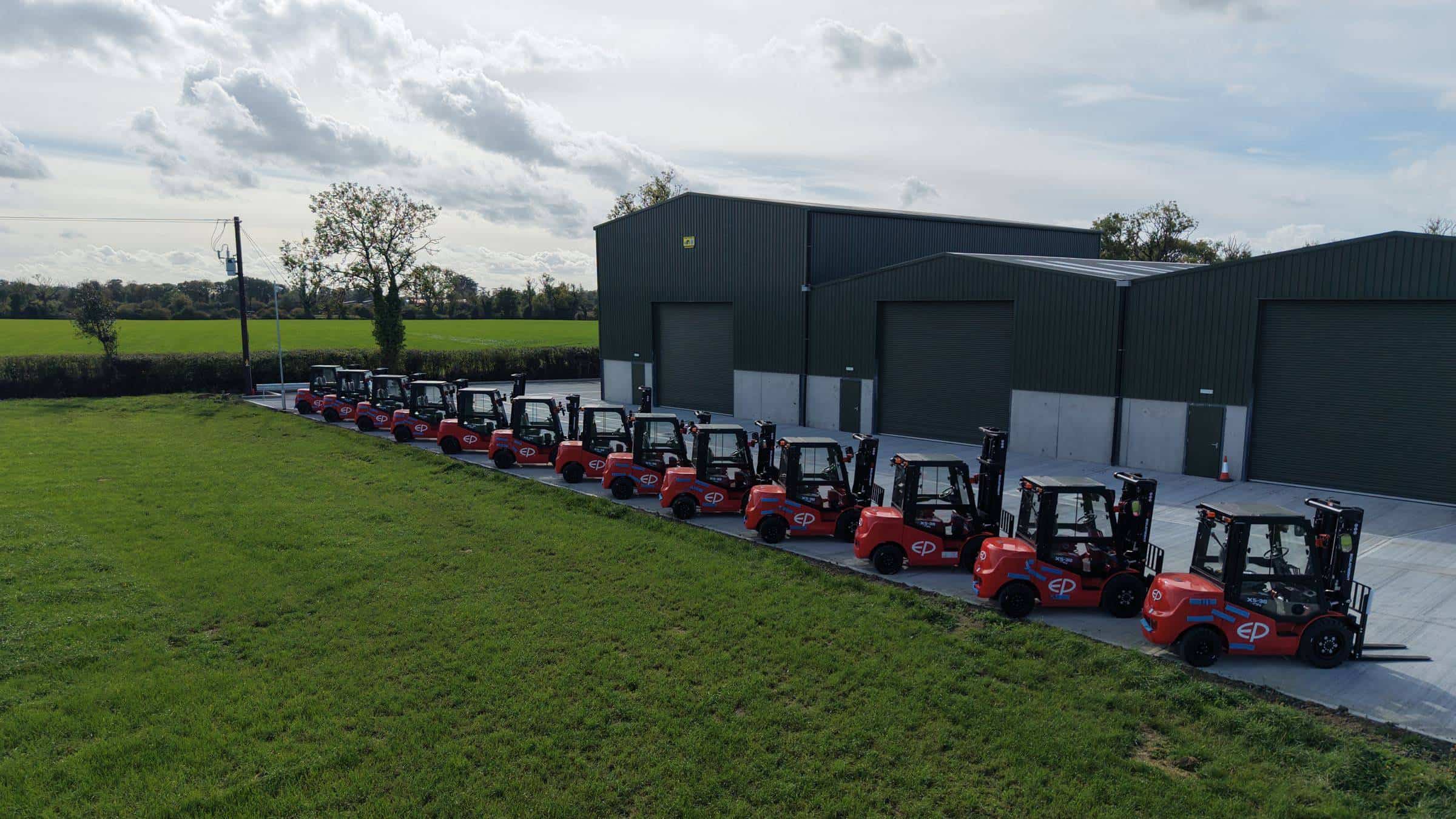 Row of new EP electric forklifts lined up outside the Clearlift depot in Navan, Co. Meath