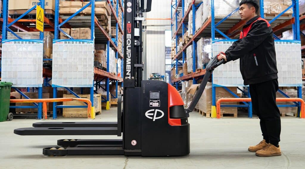 Operator using an EP electric stacker at racking