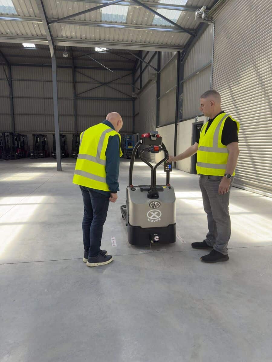 Clearlift engineer showing visitors how to teach an EP EXP15 a route