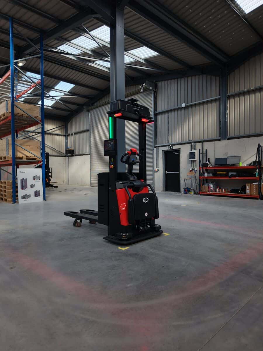 EP XQE122 autonomous stacker with lidar navigation in front of racking