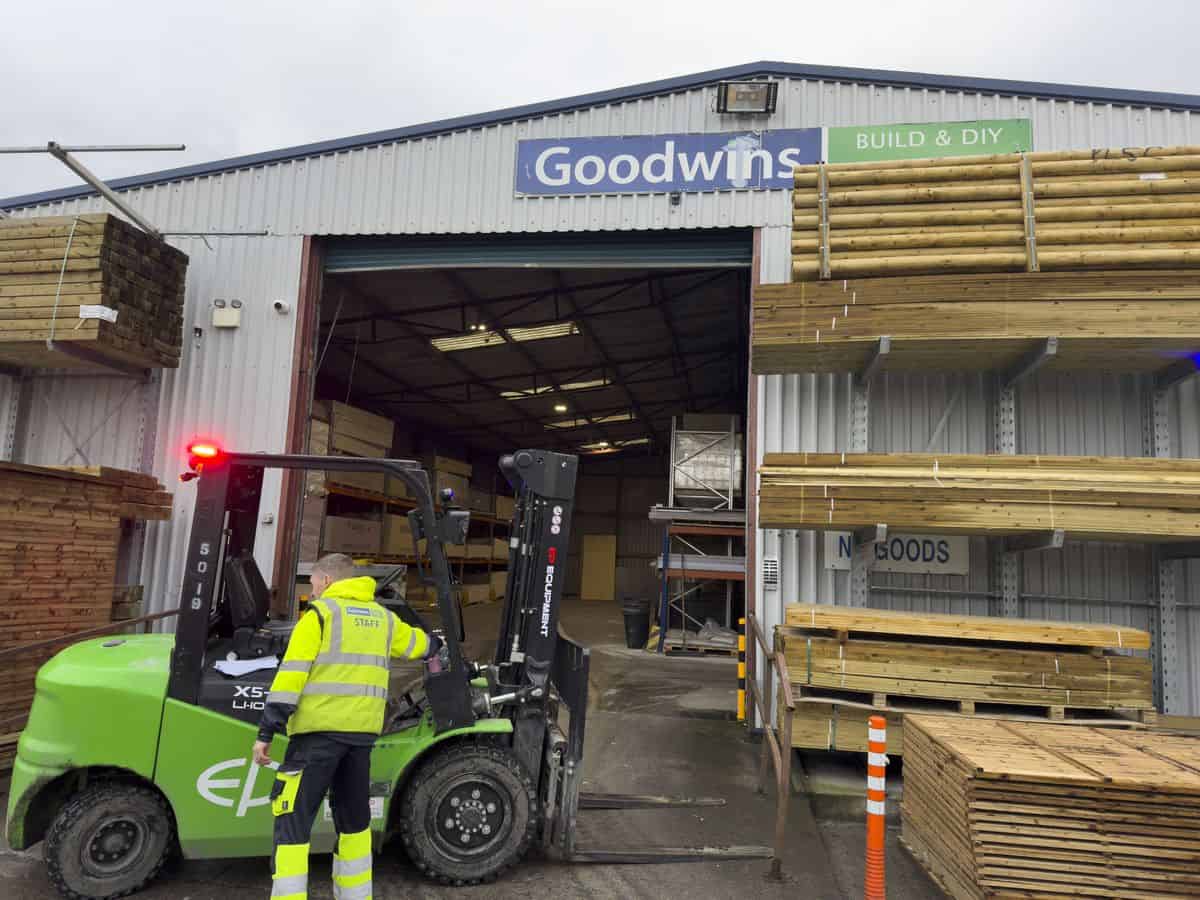 EP lithium-ion forklift with red zone safety light at a builders merchant timber store
